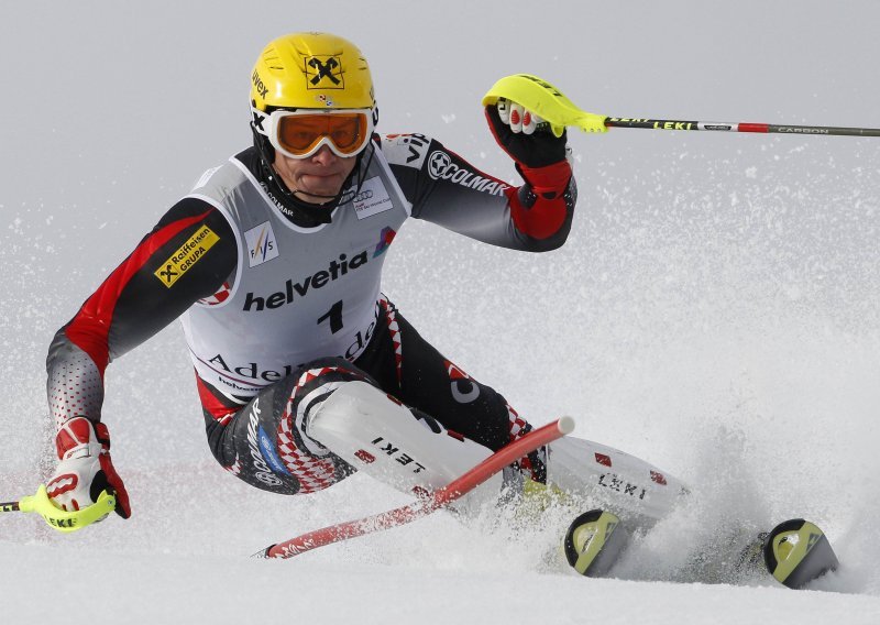 Kostelic wins Adelboden slalom, takes lead in overall rankings