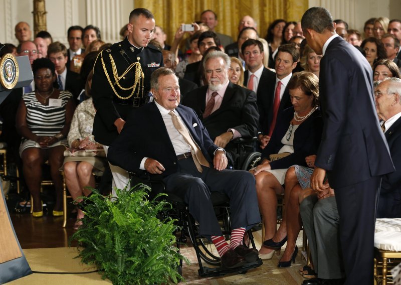 Obama: Amerika je prijaznija zahvaljujući Bushu