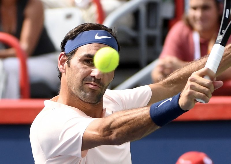 Federer nastavlja grabiti prema tituli, Dodig odličan u parovima