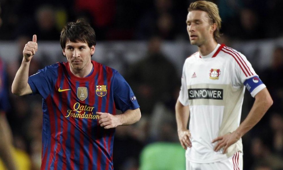 Lionel Messi i kapetan Bayera Rolfes