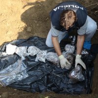 Iskopavanje ubijenih na kraju II. svjetskog rata u Gračanima