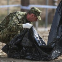 Iskopavanje ubijenih na kraju II. svjetskog rata u Gračanima