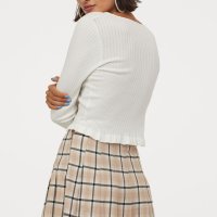 Suknja s potpisom brenda H&M