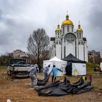 Iskapanje žrtava iz masovne grobnice u Buči