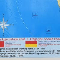 Crvena zastava na plaži Kolovare