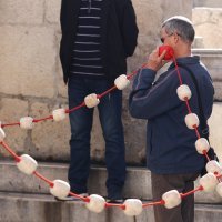 Molitelji na splitskom Peristilu