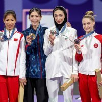 Lena Stojković na postolju i s olimpijskom broncom