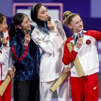 Lena Stojković na postolju i s olimpijskom broncom