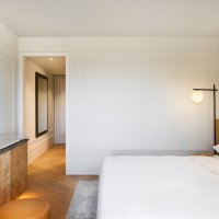 King Bed With Balcony Deluxe Hallway