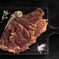 chuletón_de_buey_elcapricho_cocinado