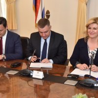 Mate Radeljić, Kolinda Grabar Kitarović