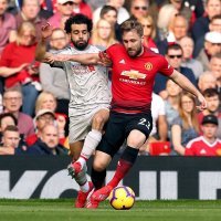 Manchester United (Luke Shaw) - Liverpool (Mohamed Salah)