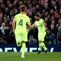 Ivan Rakitić trči prema Luisu Suarezu