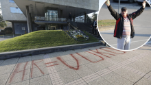 [FOTO] Muškarac revoltiran uklanjanjem murala došao pred Gradsku upravu i pisao sprejem