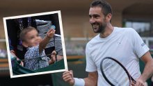 Nakon pobjede Marin Čilić potrčao u najdraži zagrljaj pa od sina dobio - novčić za sreću