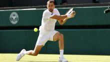 Čilić zapeo već na startu, ali zato je Prižmić upisao prvu pobjedu u All England Clubu