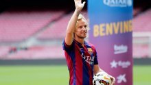 Raznježeni Ivan Rakitić u rukama kćerkice
