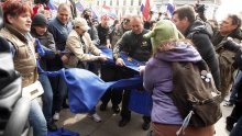Two men charged with destroying EU flag