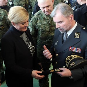 Kolinda Grabar Kitarović, Mate Laušić