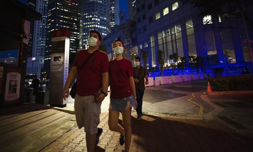 Stručnjaci hvale Singapur zbog reakcije na koronavirus, ali ona ima i svoju tamnu stranu