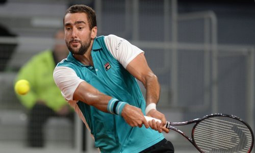 Čiliću je prekid zbog kiše godio, u nastavku meča uspio je srediti upornog Harrisona