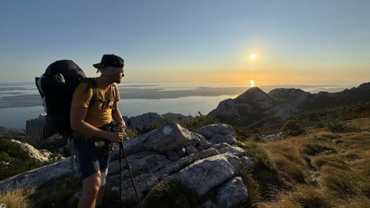 Pogled na zalazak sunca s Velebita