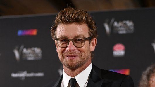 SIMON BAKER