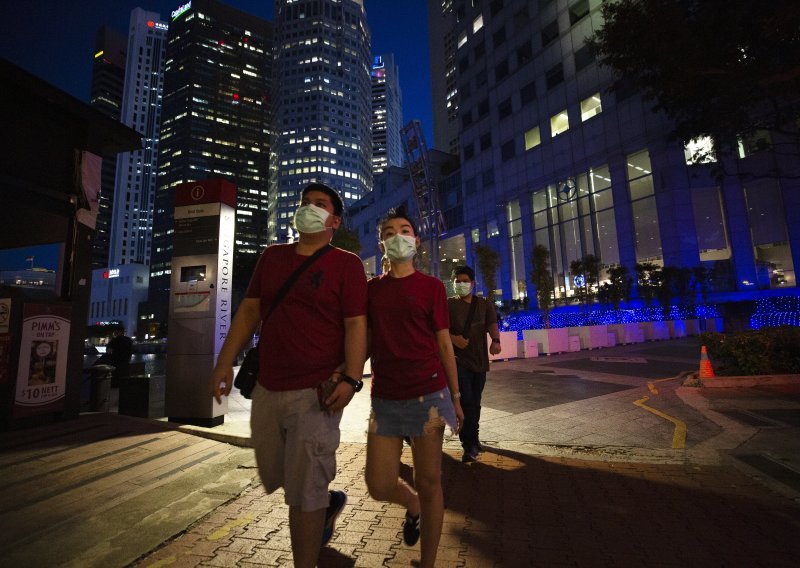 Stručnjaci hvale Singapur zbog reakcije na koronavirus, ali ona ima i svoju tamnu stranu