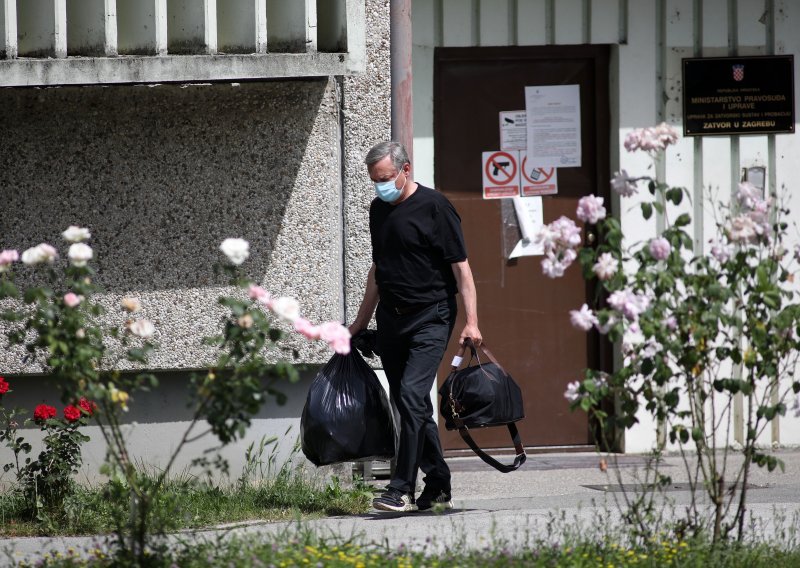 [FOTO] Suspendirani osječki sudac Kvesić izišao je iz Remetinca; dočekao ga odvjetnik