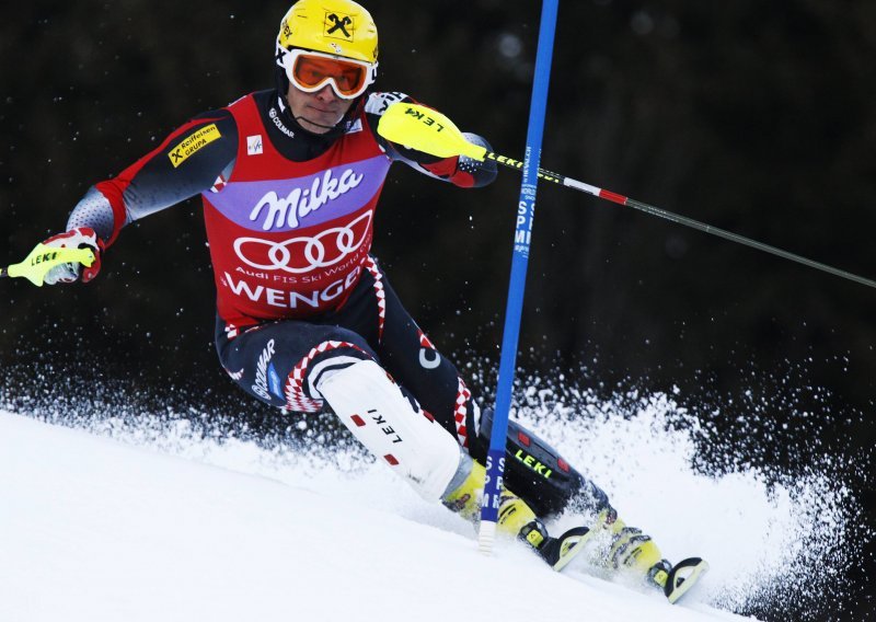Kostelic claims men's overall World Cup crown