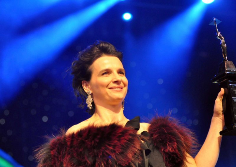 Rob bio na večeri s Juliette Binoche