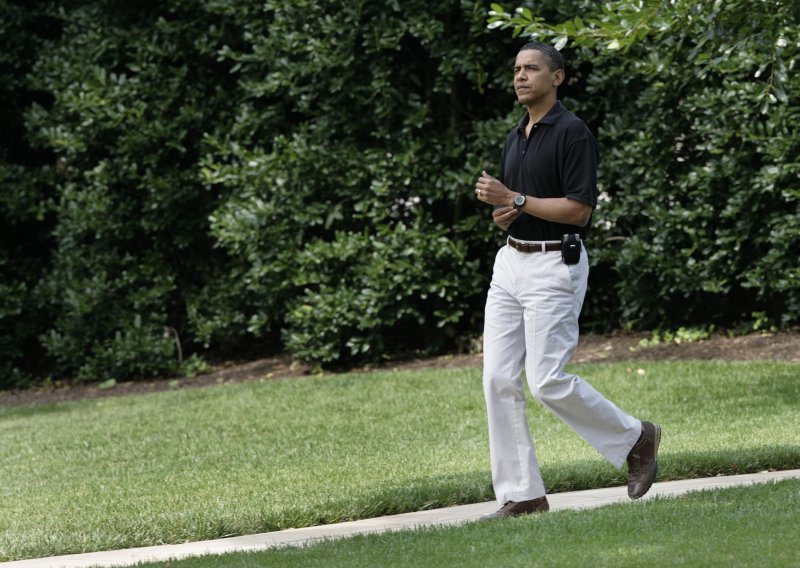 Obama prvi dan 2011. proveo na plaži