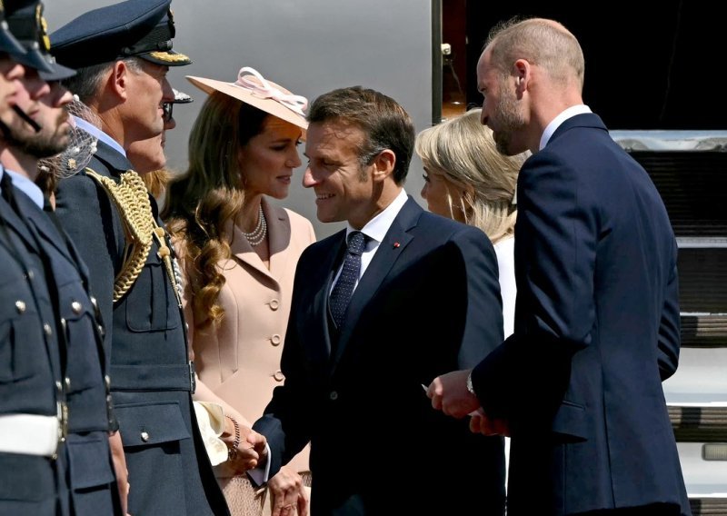 Neobična gesta Emmanuela Macrona zbunila javnost: Je li poljubac s Kate Middleton bio 'too much'?