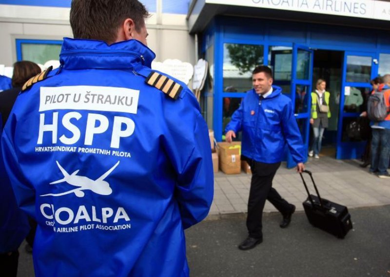 Pilots reach deal; flight attendants to continue strike