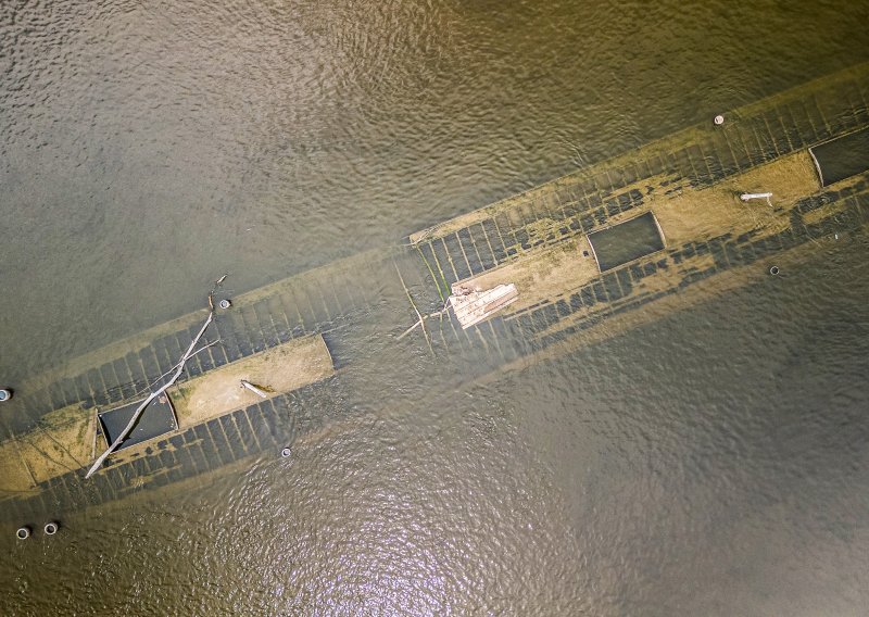 FOTO Niski vodostaj Dunava otkrio povijesno blago: Pogledajte što je izronilo kod Opatovca