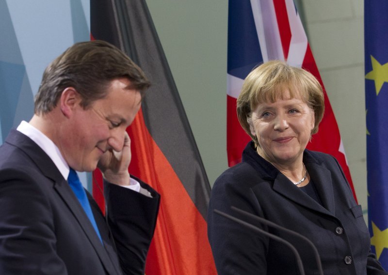 Cameron i Merkel proveli vikend zajedno zbog poreza