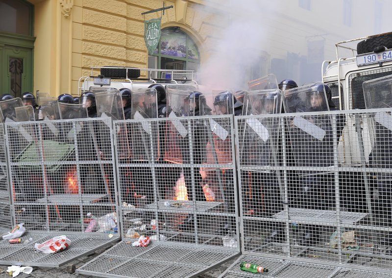 58 rioters taken into custody, 33 people injured