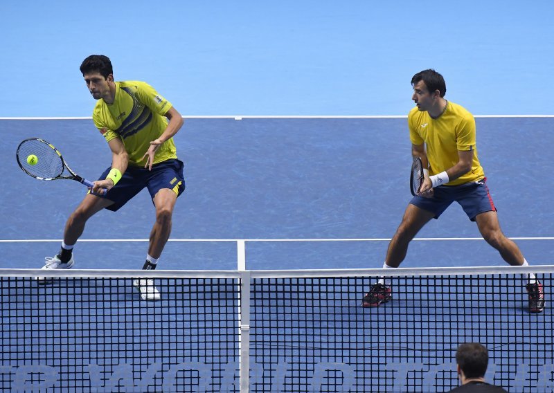 Kraj za Dodiga i Mela, Đoković i Raonic u polufinalu