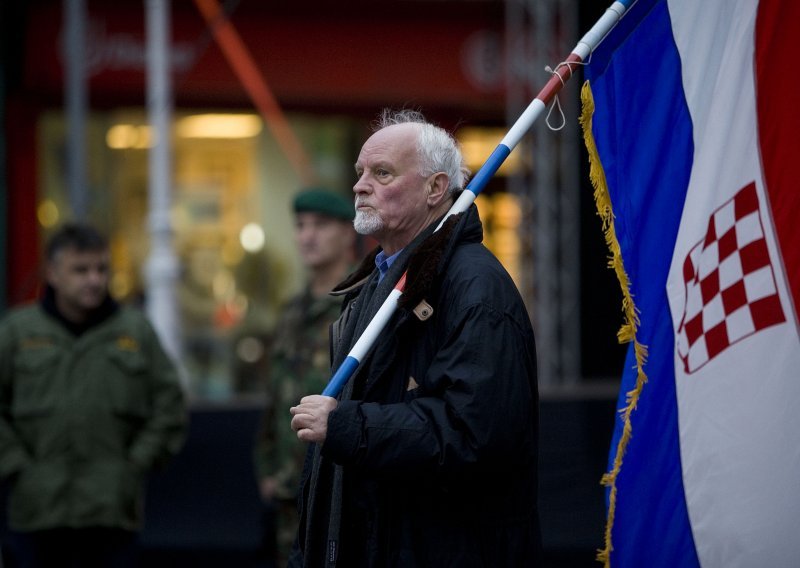 Veterans and citizens gather at main square, waiting to hear final verdict against generals