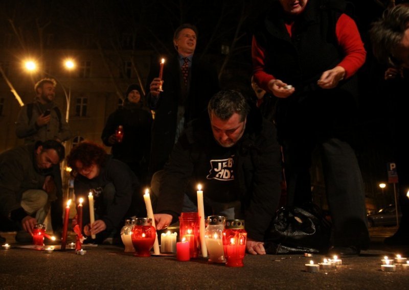 Civic Action activists light candles outside HDZ election HQ