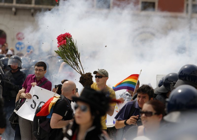 Four reporters injured, 70 people arrested during LGBT parade