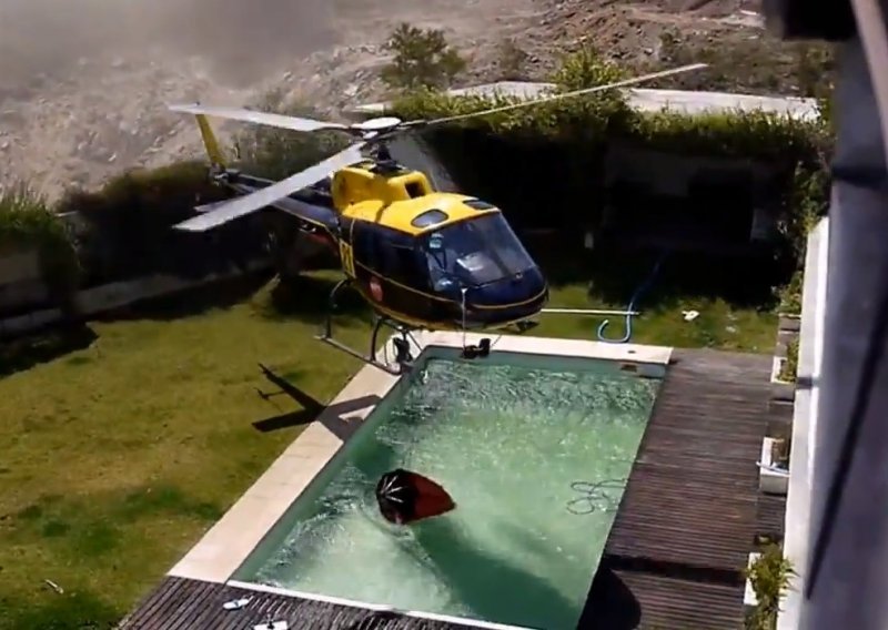 Pogledajte kako vatrogasni helikopter krade vodu iz bazena