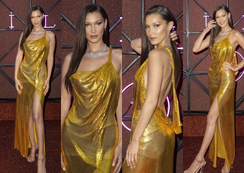 Lijepa brineta izgleda kao milijun dolara u glamuroznoj zlatnoj haljini