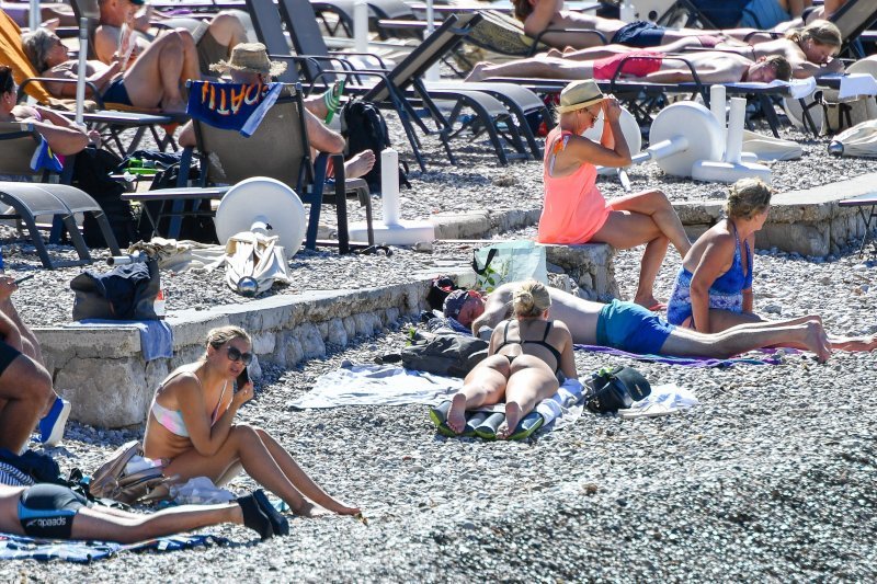 Kupanje u listopadu na plaži Lapad u Dubrovniku