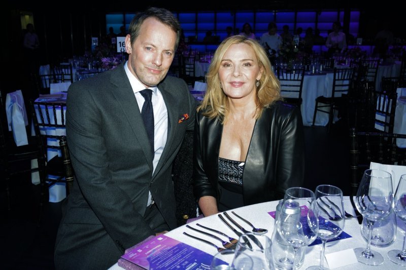 Kim Cattrall i Russell Thomas