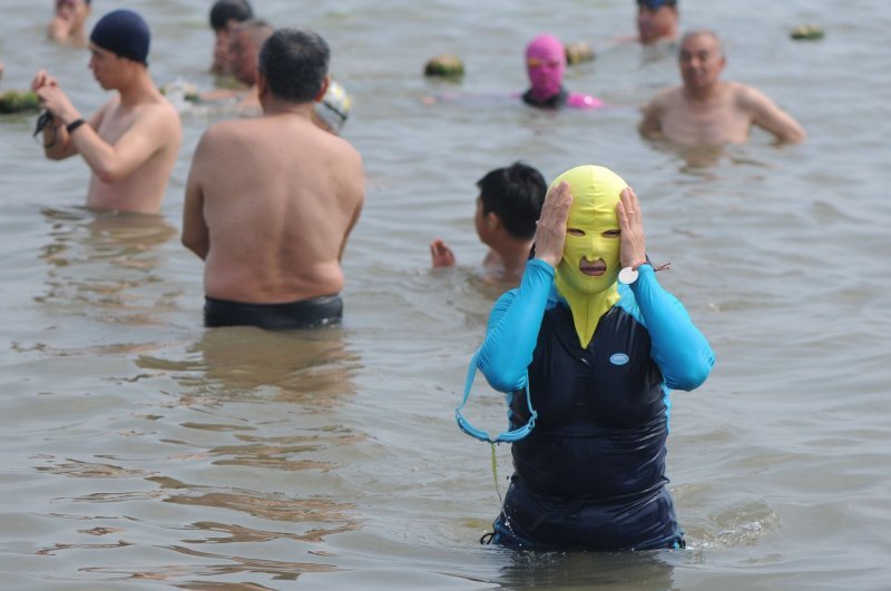 'Facekini' - bikini za glavu na kineskoj plaži