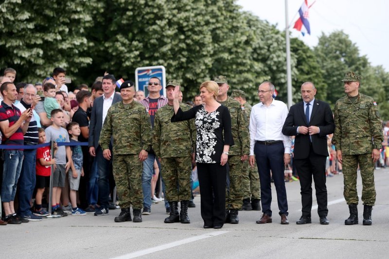 Kolinda Grabar Kitarović, Damir Krstičević