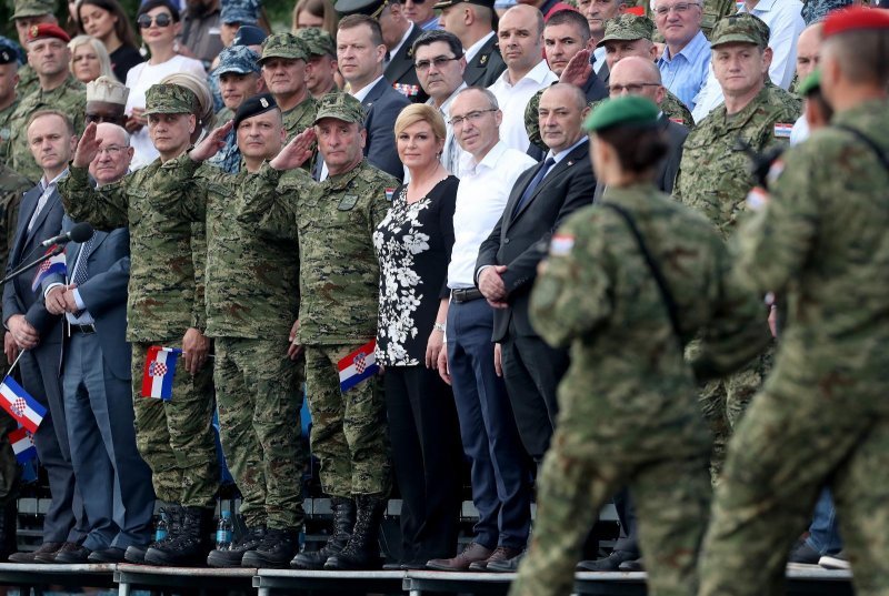 Kolinda Grabar Kitarović, Damir Krstičević