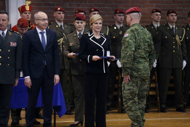 Damir Krstičević, Kolinda Grabar Kitarović