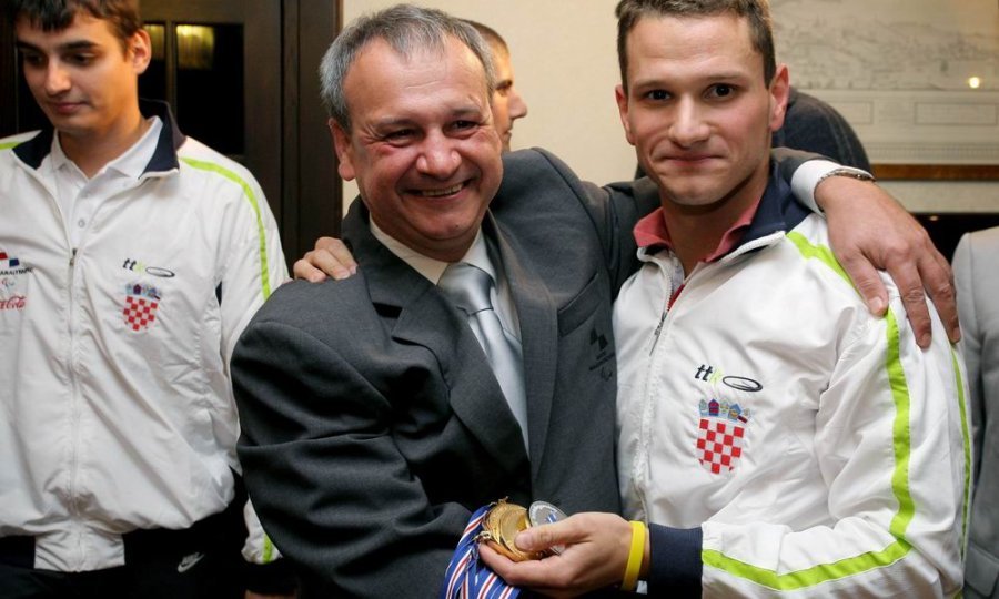 Plivač Mihovil Španja i predsjednik Hrvatskog paraolimpijskog odbora Ratko Kovačić